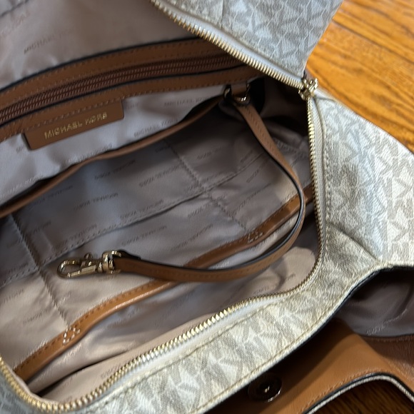 Michael Kors handbag. Vanilla color with tan straps and gold hardware. - Picture 9 of 16